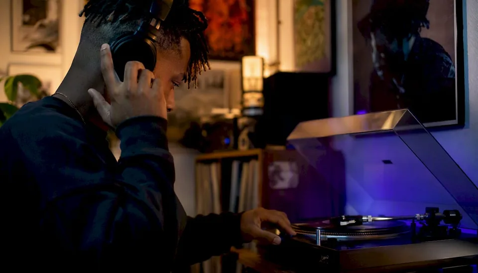 Musician listening carefully with headphones