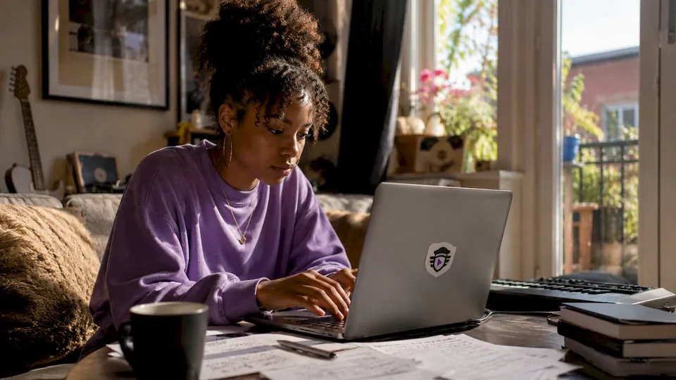 Independent artist pitching music on laptop